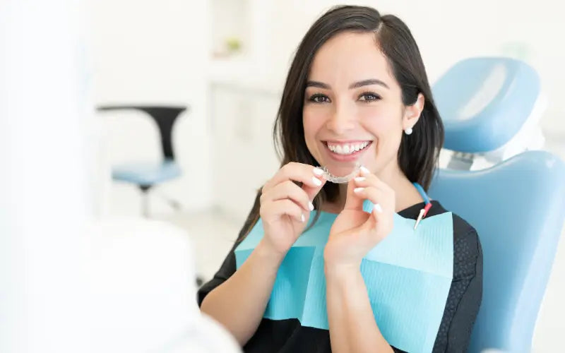 A female patient undergoing Clear Aligner treatment