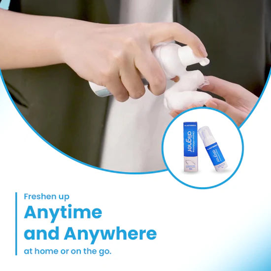 ALIGNERCO aligner foam being dispensed onto hands for portable cleaning