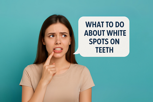 A girl wondering what to do about white spots on teeth.
