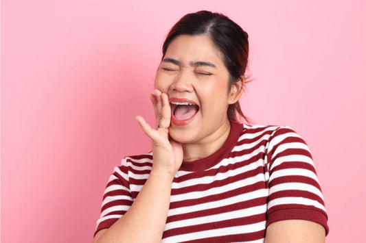 A girl feels brace pain