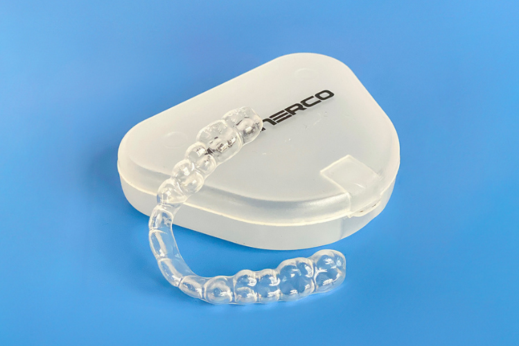 ALIGNERCO NightOnly Clear Aligners placed with its container.