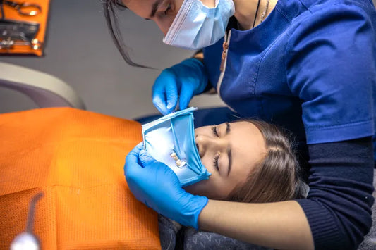 A kid going through a dental surgery