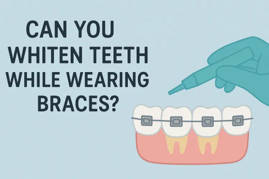 A hand holding aligners with attachments