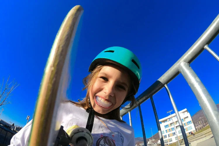 Child-smiling-with-mouth-guard-on