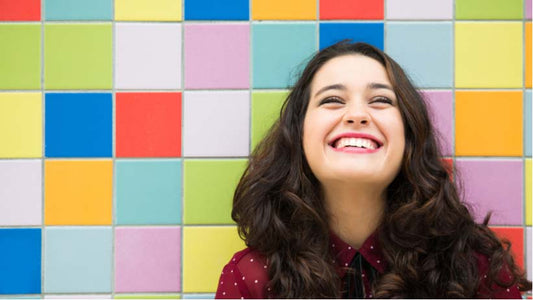 relation between smiling and happiness