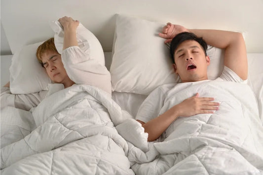 woman is disturbed by her partner's snoring